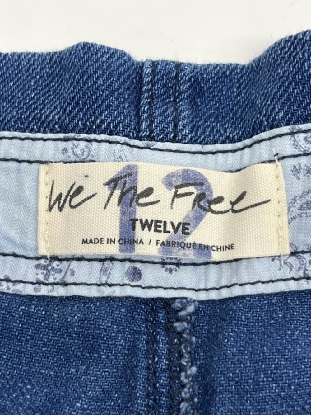 We The Free Blue Denim Jeans with Light Blue Waistband Detail